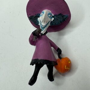 Purple Figurine with Pumpkin